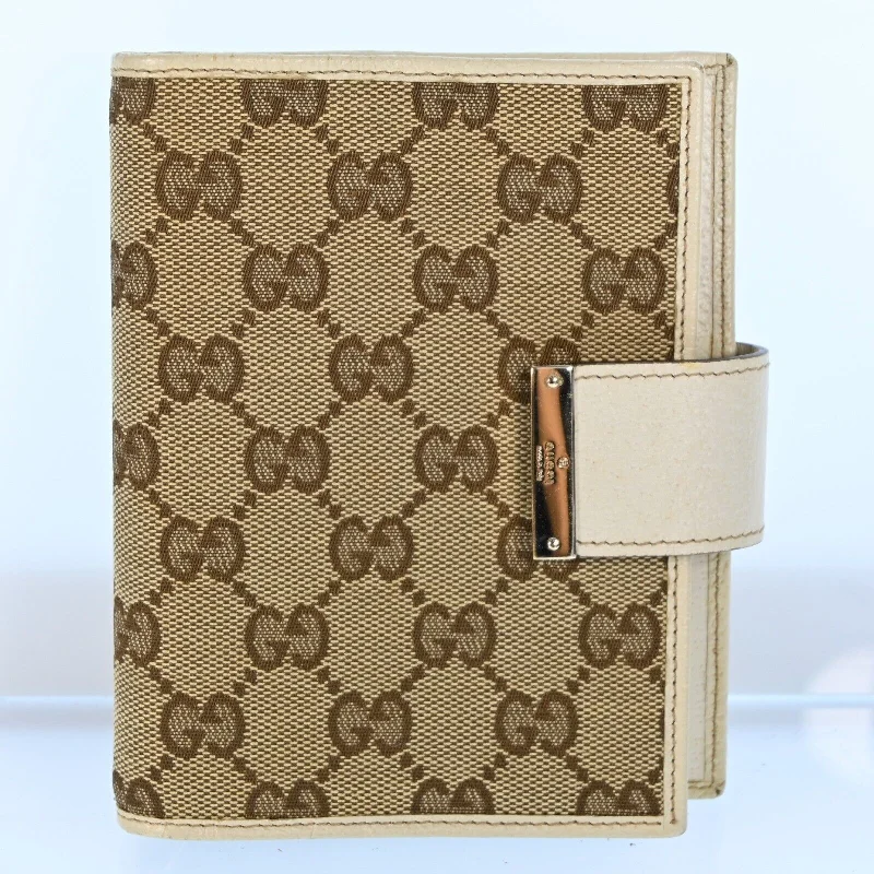 Gucci Marmont bags for women with a contrast - colored interiorGucci Gg Canvas Planner Cover Beige