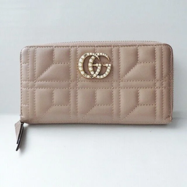 Women Gucci Sylvie bags featuring the signature web stripeGucci Gg Marmont Gray Beige Leather