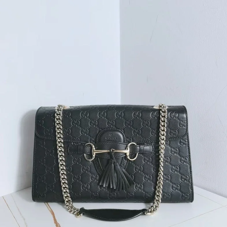 Women Gucci bags with a zippered interior pocketGucci Emily Black Calfskin Embossed GG Logo Crossbody Bag