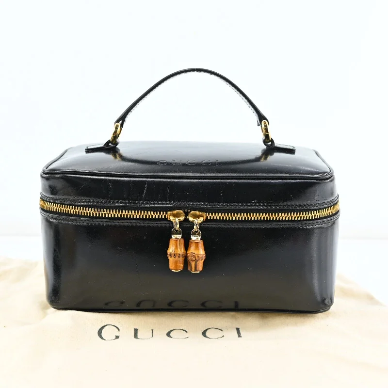 Ladies Gucci handbags with a detachable coin purse insideGucci Vanity Cosmetic Pouch Enamel Black