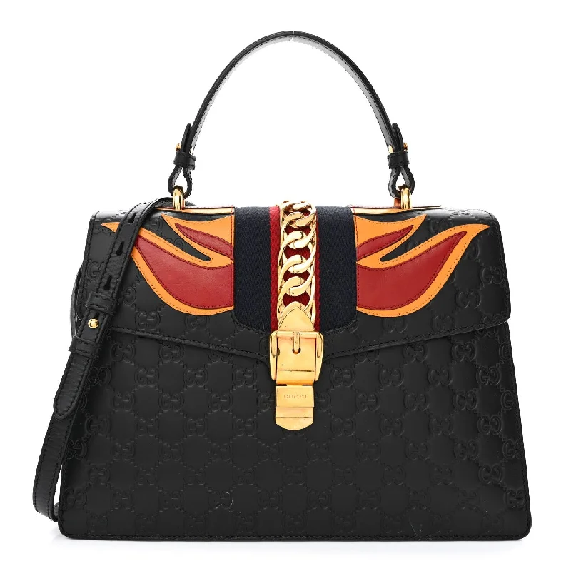 Ladies Gucci Dionysus bags with a star - shaped charmGucci Guccissima Signature Medium Sylvie