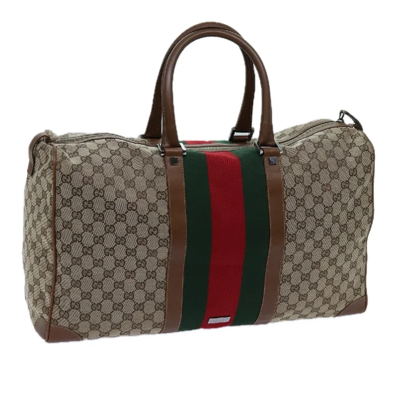 Women Gucci Sylvie bags with a monogram - embossed leatherGucci Gg Canvas Web Sherry Line Boston