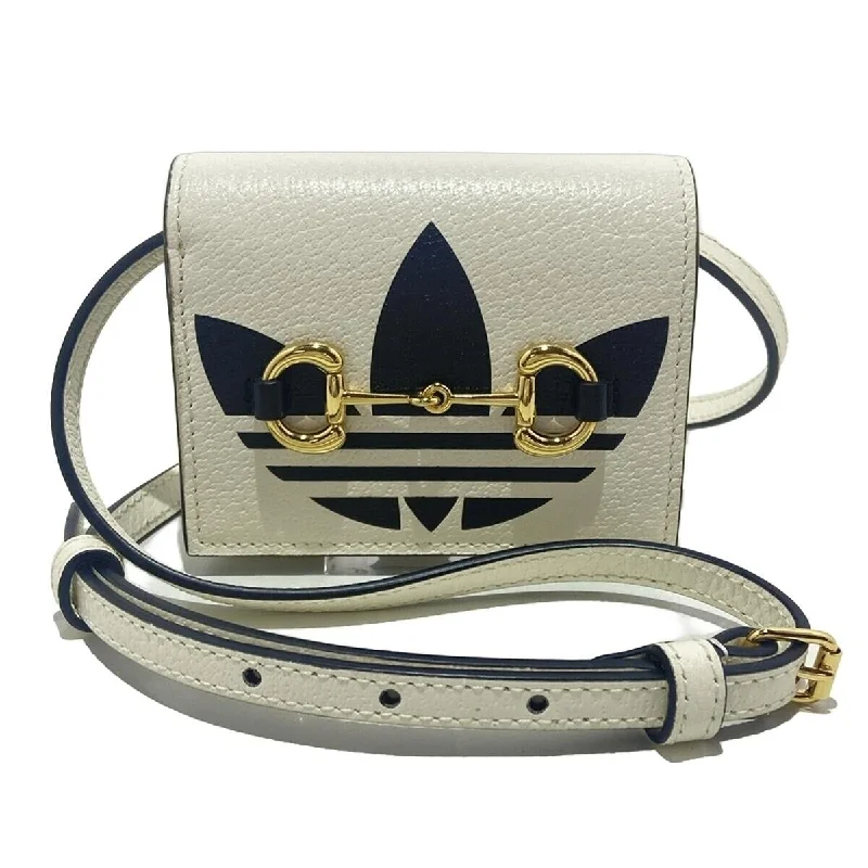 Ladies Gucci shoulder bags with a tassel decorationGucci Horsebit White Black Leather