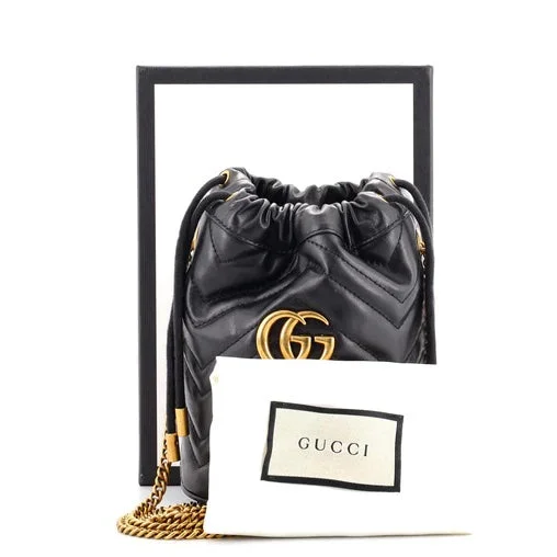 Ladies Gucci shoulder bags with a tassel decorationGUCCI GG MARMONT MINI BUCKET BAG