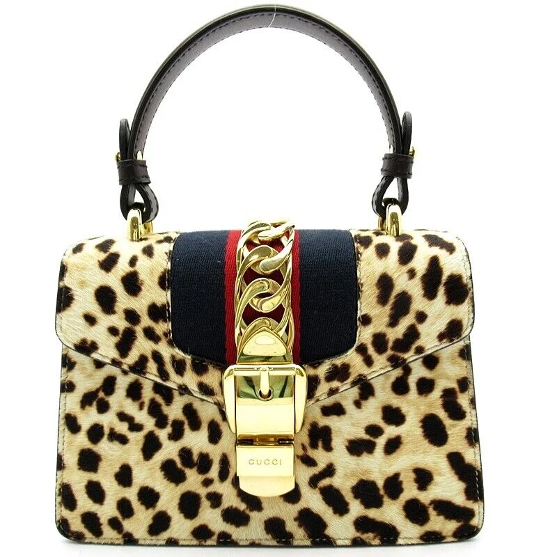 Women Gucci tote bags in GG Supreme canvas for a branded feelGucci Sylvie 2Way Handbag Harako /