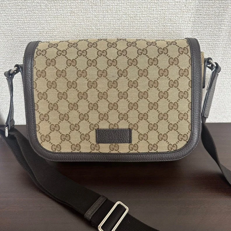 Women Gucci bags with a snap - button closure and a decorative charmGucci GG Canvas Brown Flap Crossbody Bag