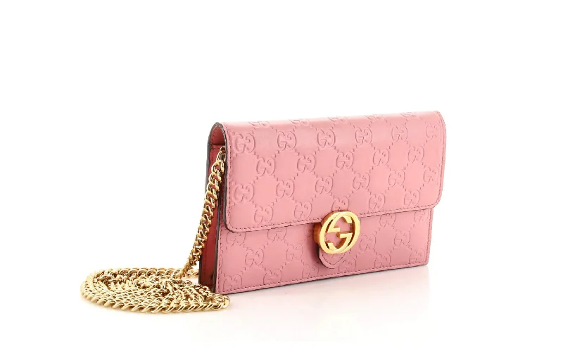 Women Gucci Sylvie bags with a monogram - embossed leatherGUCCI GUCCISSIMA LEATHER ICON CHAIN WALLET