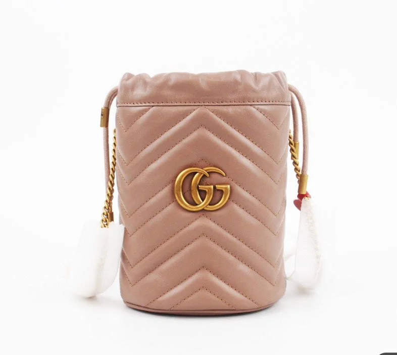 Women Gucci bags with a zippered interior pocketGucci GG Beige Leather Bucket Bag Small