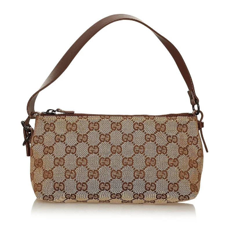 Gucci tote bags for women with a spacious interiorGucci GG Canvas Baguette