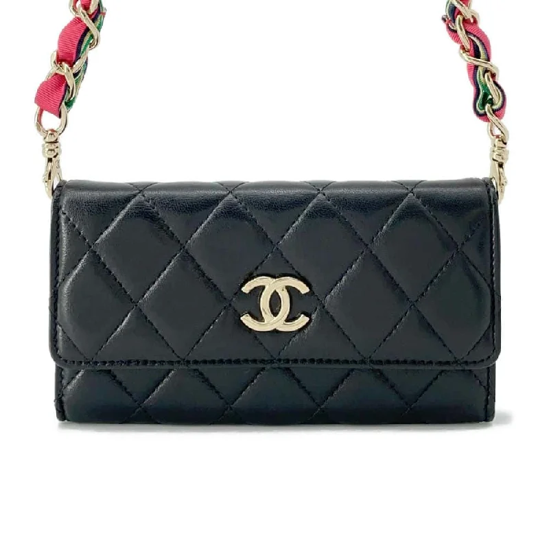 Chanel bags in luxury boutiques worldwideCHANEL Matelasse Flap Chain Wallet Black Lambskin