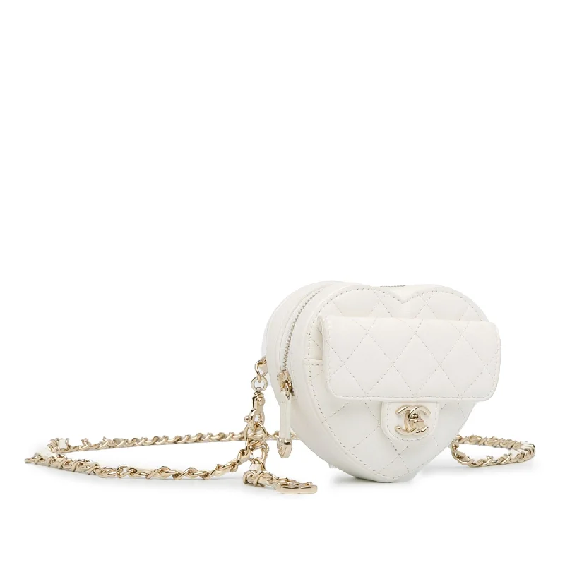 Chanel bags available at online luxury retaileChanel Mini Lambskin CC in Love Heart Belt Bag (EvulW7)