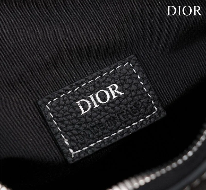 Christian Dior handbags with a snap - button closure and a decorative buckleDior Bag