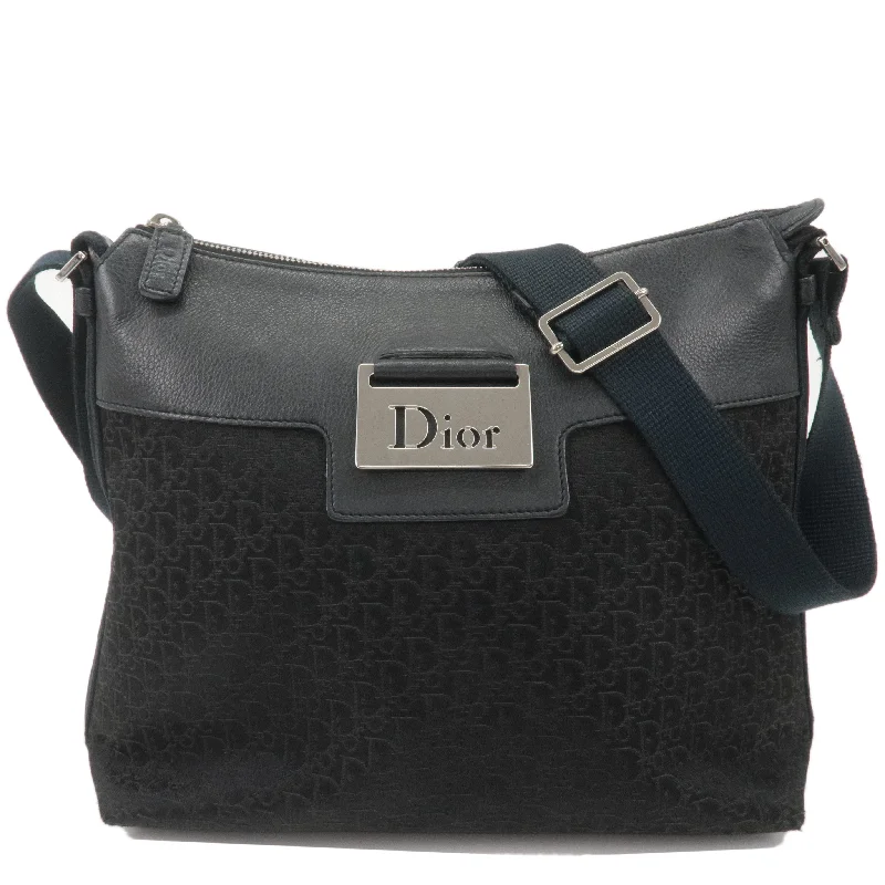 Contemporary Christian Dior handbags with a unique shapeChristian Dior Trotter Canvas Leather Shoulder Bag Black