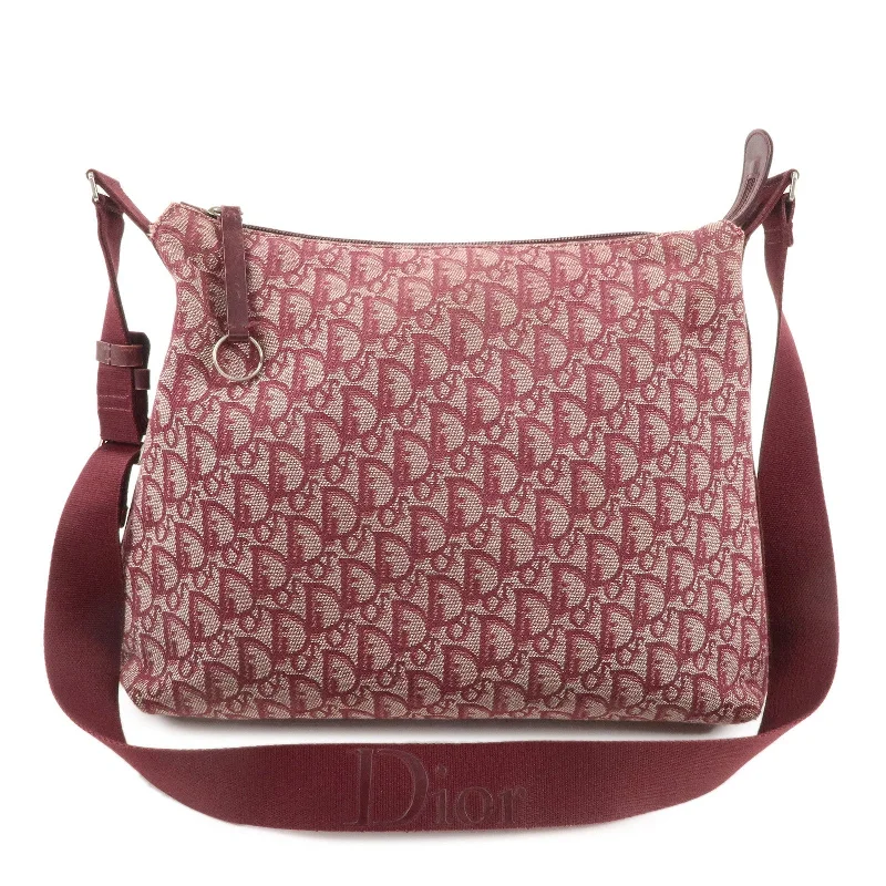 Christian Dior Saddle bags with a studded trim for a bold lookChristian Dior Trotter Canvas Leather Shoulder Bag Red BOB0072