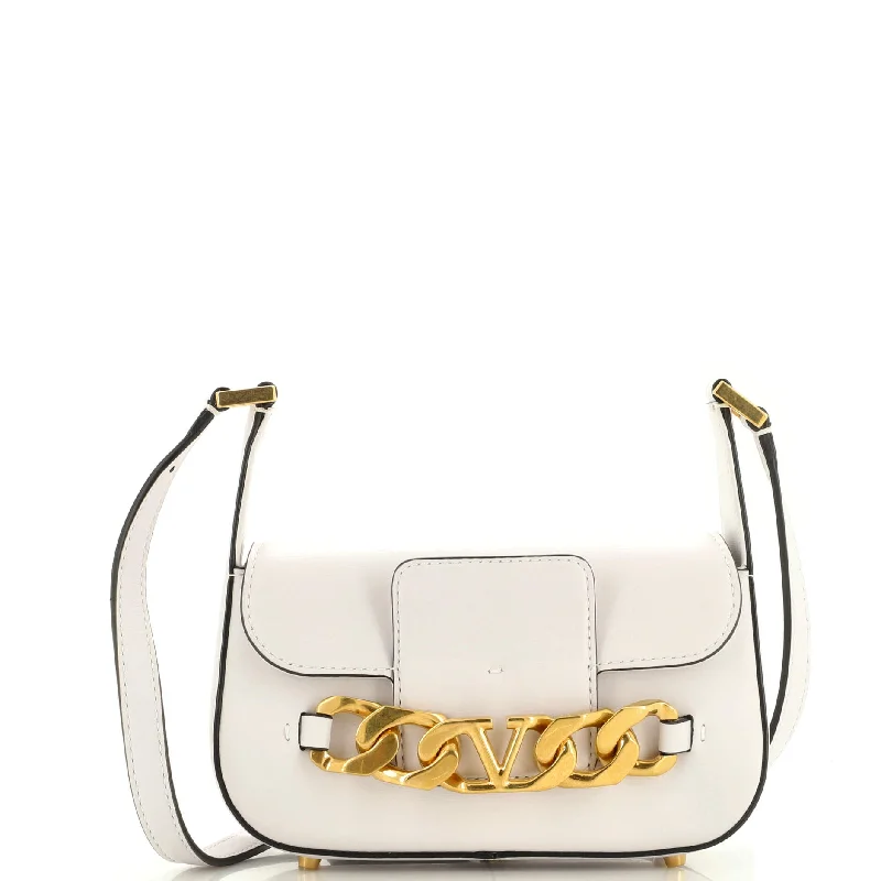 Christian Dior Saddle bags with a studded trim for a bold lookVLogo Chain Flap Shoulder Bag Leather Small